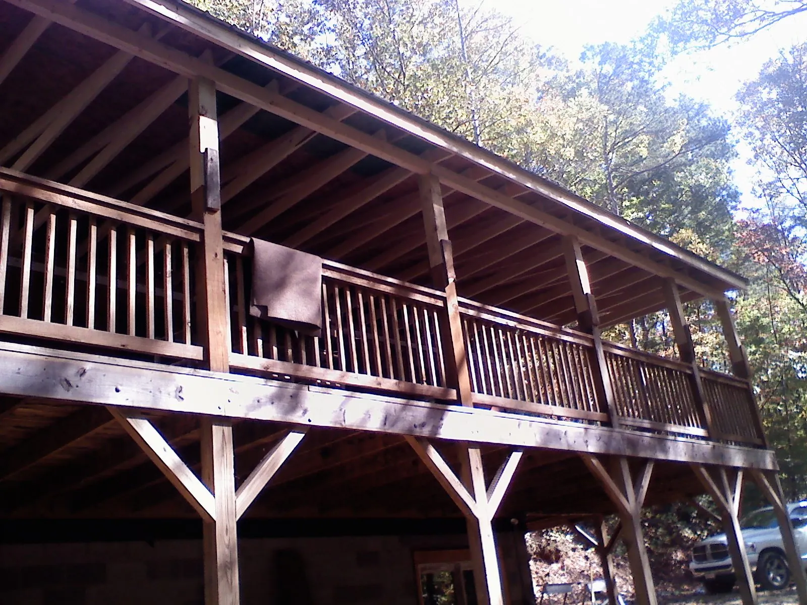 Timber framing under a new elevated porch and deck — Roof Leak Repair in Knights Landing by Roofing Brothers